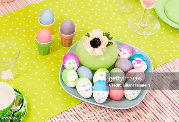 easter eggs with amusing decoration - anthropomorphic stock pictures, royalty-free photos & images