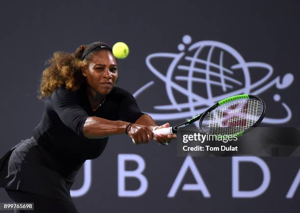 Serena Williams of United States plays a backhand during her Ladies Final match against Jelena Ostapenko of Latvia on day three of the Mubadala World...