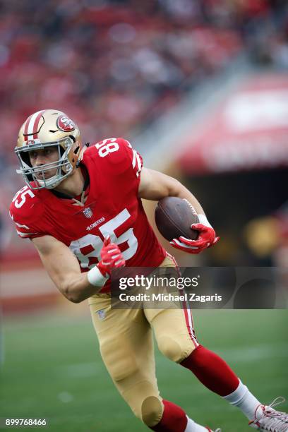 George Kittle of the San Francisco 49ers runs after making a reception during the game against the Jacksonville Jaguars at Levi's Stadium on December...