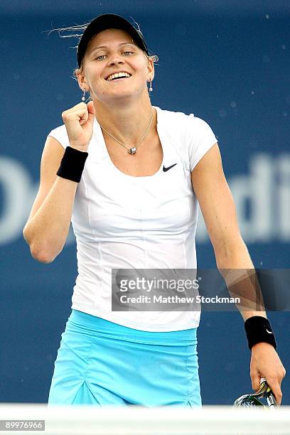 Lucie Safarova of the Czech Republic celebrates match point against Jie Zheng of China during the Rogers Cup at the Rexall Center on August 20, in...