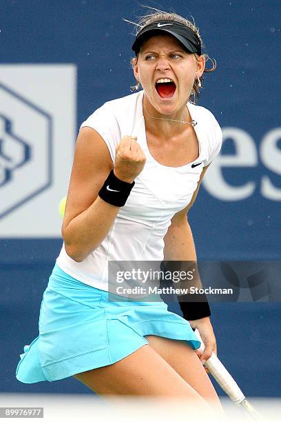 Lucie Safarova of the Czech Republic celebrates match point against Jie Zheng of China during the Rogers Cup at the Rexall Center on August 20, in...