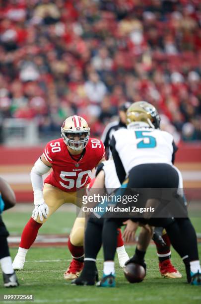Brock Coyle of the San Francisco 49ers eyes the quarterback during the game against the Jacksonville Jaguars at Levi's Stadium on December 24, 2017...