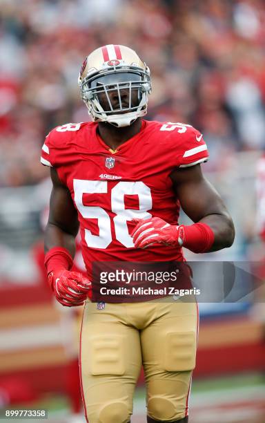 Elvis Dumervil of the San Francisco 49ers stands on the field during the game against the Jacksonville Jaguars at Levi's Stadium on December 24, 2017...