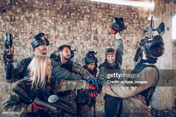 paintball crew - paintball stock pictures, royalty-free photos & images