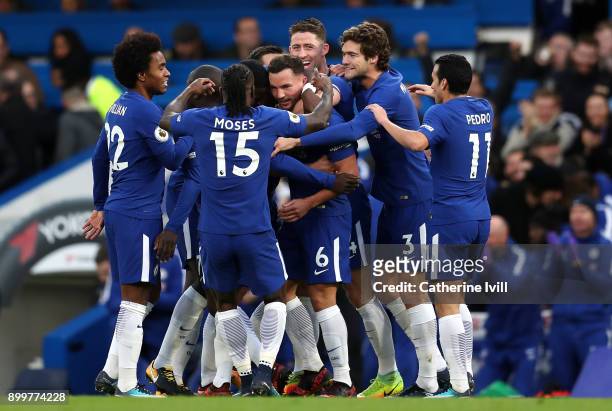 Danny Drinkwater of Chelsea celebrates scoring his team's second goal with team mates during the Premier League match between Chelsea and Stoke City...
