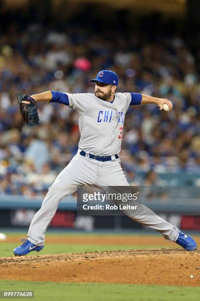Brian Duensing of the Chicago Cubs pitches during Game 2 of the National League Championship Series against the Los Angeles Dodgers at Dodger Stadium...