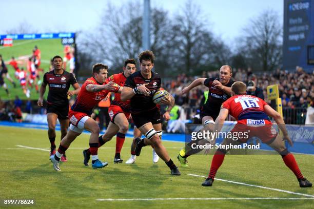 Michael Rhodes of Saracens and Chris Pennell of Worcester Rugby compete for the ball during the Aviva Premiership match between Saracens and...