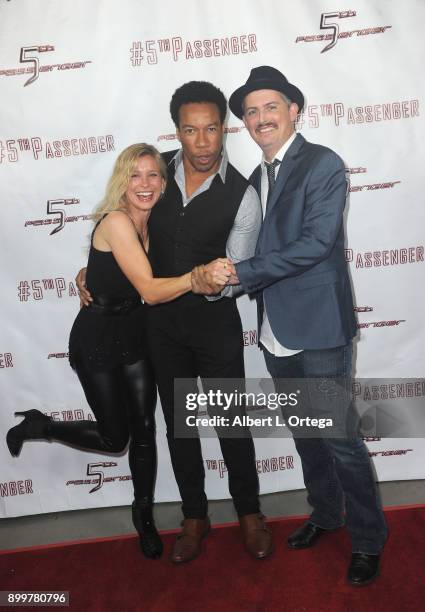 Actors Tarah Paige, Rico E. Anderson and Manu Intiraymi arrive for the cast and crew screening of 5th Passenger held at TCL Chinese 6 Theatres on...