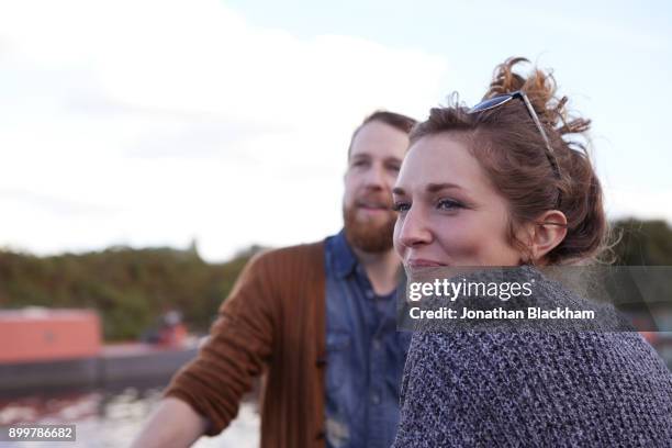couple on canal boat - moment of silence stockfoto's en -beelden