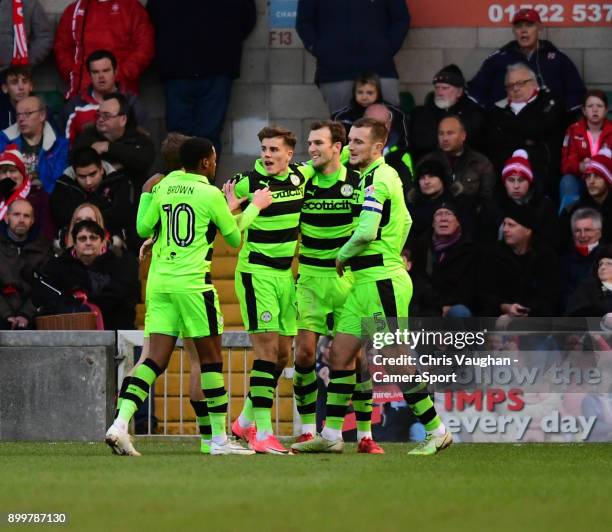Forest Green Rovers' Christian Doidge, second in from right, celebrates scoring his sides equalising goal to make the score 1-1 with team-mates, from...