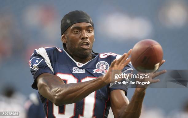 Randy Moss of the New England Patriots catches a pass during warm ups against the Cincinnati Bengals during their preseason game at Gillette Stadium...