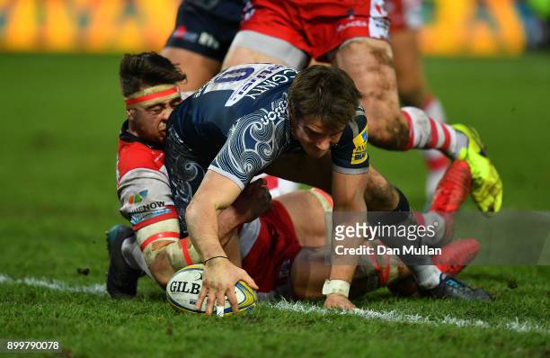 Alan MacGinty of Sale Sharks dives over to score his sides first try during the Aviva Premiership match between Gloucester Rugby and Sale Sharks...