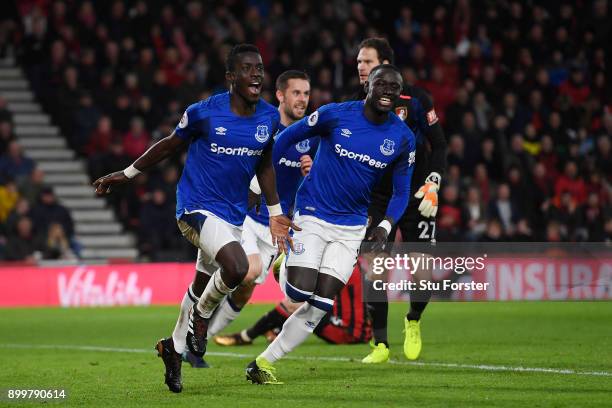 Idrissa Gueye of Everton celebrates scoring his team's opening goal with Oumar Niasse of Everton during the Premier League match between AFC...