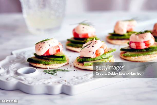 tiger prawn blinis on serving board, close-up - canapes stock pictures, royalty-free photos & images