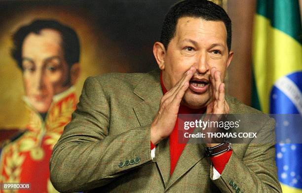 Venezuelan President Hugo Chavez gestures during a ceremony where he met with a Brazilian delegation at Miraflores presidential palace in Caracas on...