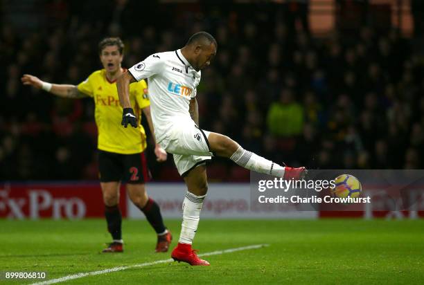 Jordan Ayew of Swansea City scores his team's first goal during the Premier League match between Watford and Swansea City at Vicarage Road on...