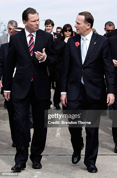 New Zealand Prime Minister John Key and Premier of NSW Nathan Rees talk following a memorial service at the Australian Soldier memorial statue on...