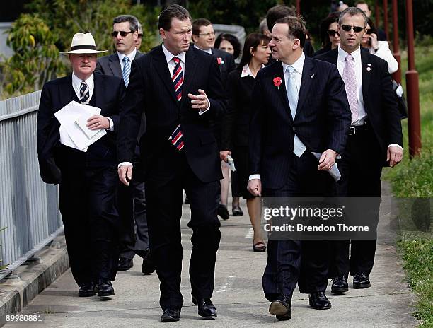 New Zealand Prime Minister John Key and Premier of NSW Nathan Rees talk following a memorial service at the Australian Soldier memorial statue on...