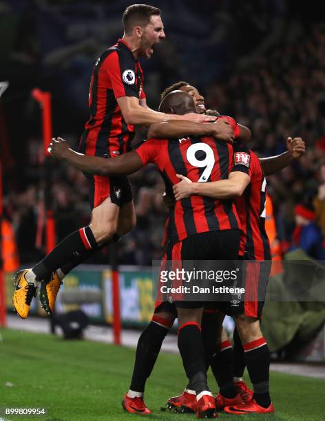 Dan Gosling of AFC Bournemouth celebrates his team's second goal with scorer Ryan Fraser during the Premier League match between AFC Bournemouth and...
