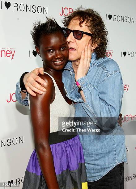 Model Ataui Deng and photographer Mick Rock attend the Charlotte Ronson and JCPenney's celebration of I Heart Ronson at The Lighthouse at Chelsea...