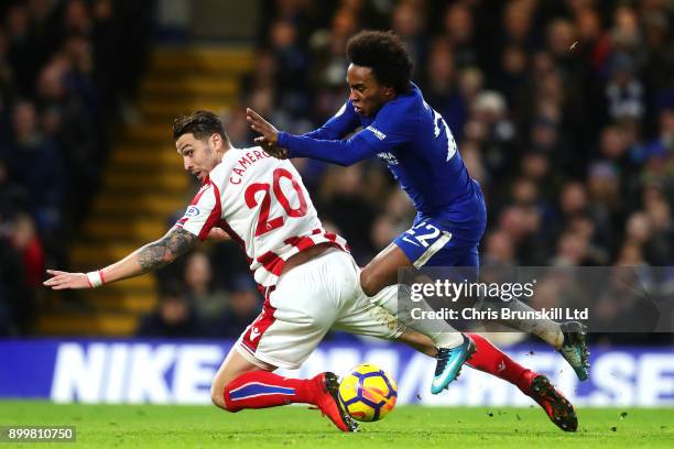 Willian of Chelsea is fouled by Geoff Cameron of Stoke City and a penalty is awarded during the Premier League match between Chelsea and Stoke City...