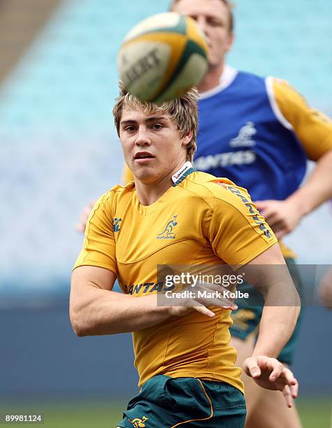 James O'Connor passes during the Australian Wallabies captain's run at ANZ Stadium on August 21, 2009 in Sydney, Australia.