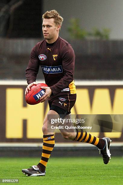 Sam Mitchell of the Hawks kicks during a Hawthorn Hawks AFL training session at Waverley Park on August 21, 2009 in Melbourne, Australia.