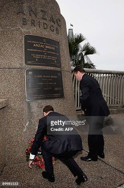 New Zealand Prime Minister John Key and New South Wales Premier Nathan Rees lay a wreath at the commemorative soldier memorial statue on Anzac Bridge...