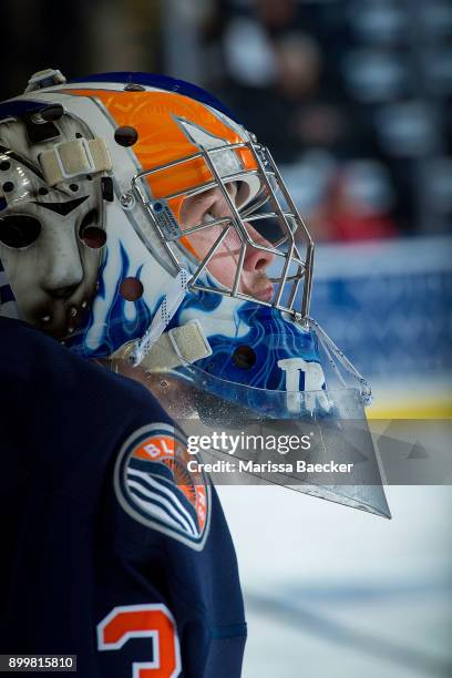Dylan Ferguson of the Kamloops Blazers stands at the bench during warm up against the Kelowna Rockets on December 27, 2017 at Prospera Place in...
