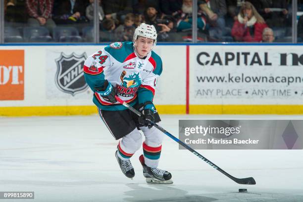 Kyle Topping of the Kelowna Rockets skates with the puck against the Kamloops Blazers on December 27, 2017 at Prospera Place in Kelowna, British...