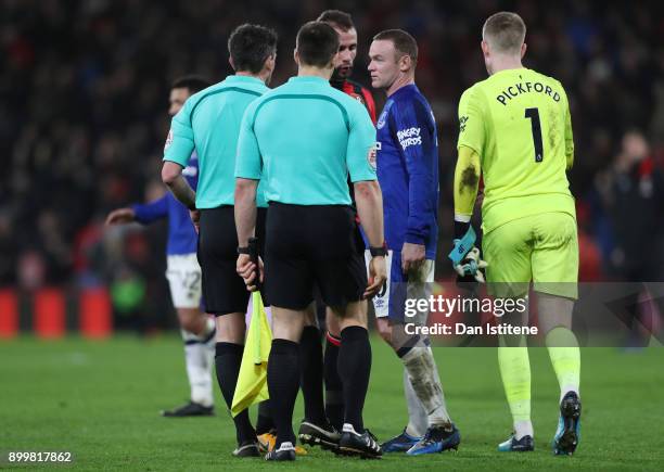 Wayne Rooney of Everton speak to referee Lee Probert during the Premier League match between AFC Bournemouth and Everton at Vitality Stadium on...