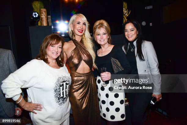 Ivonne Camacho, Tracy Stern, Sue Vaccaro and Cassandra Seidenfeld attend Tracy Stern hosts holiday party at private townhouse in Hell's Kitchen at...
