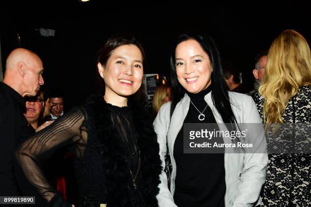 Soojin Park and Cassandra Seidenfeld attend Tracy Stern hosts holiday party at private townhouse in Hell's Kitchen at Private Residence on December...