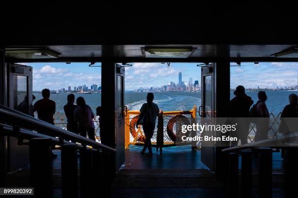 passengers travel on the staten island ferry in new york city - staten island fotografías e imágenes de stock