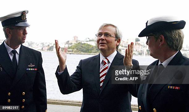 Australian Prime Minister Kevin Rudd is greeted by Commander Christine Clarke and Rear Admiral Nigel Coates upon his arrival to the Heritage Centre...