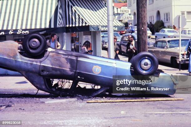 City of Berkeley car was torched and overturned on te first day of the Peoples Park conflict.