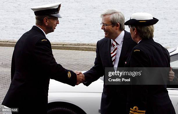 Australian Prime Minister Kevin Rudd is greeted by Commander Christine Clarke and Rear Admiral Nigel Coates on arrival at the Heritage Centre at...