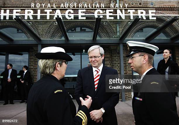 Australian Prime Minister Kevin Rudd speaks with Commander Christine Clarke and Rear Admiral Nigel Coates after arriving at the Heritage Centre at...