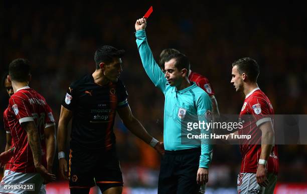 Danny Batth of Wolverhampton Wanderers is shown a red card during the Sky Bet Championship match between Bristol City and Wolverhampton Wanderers at...