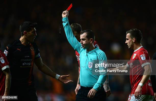 Danny Batth of Wolverhampton Wanderers is shown a red card during the Sky Bet Championship match between Bristol City and Wolverhampton Wanderers at...