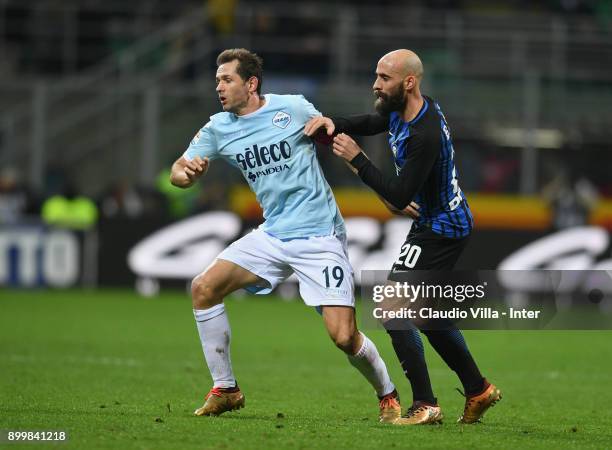 Borja Valero Iglesias of FC Internazionale competes for the ball with Senad Lulic of SS Lazio during the serie A match between FC Internazionale and...