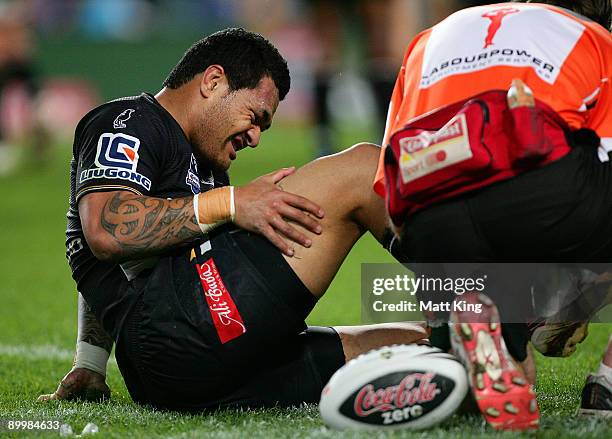 Taniela Tuiaki of the Tigers sustains an injury during the round 24 NRL match between the Wests Tigers and the Parramatta Eels at the Sydney Football...