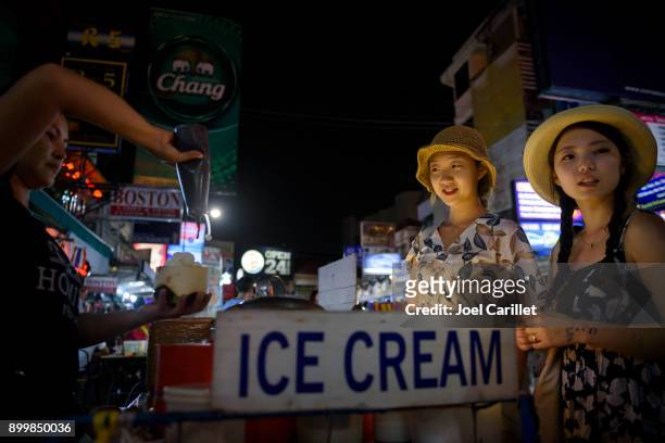 coconut ice cream on khao san road, bangkok, thailand - banglamphu stock pictures, royalty-free photos & images