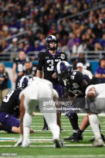 Horned Frogs place kicker Cole Bunce looks at the uprights during the Valero Alamo Bowl between the Stanford Cardinal and the TCU Horned Frogs on...