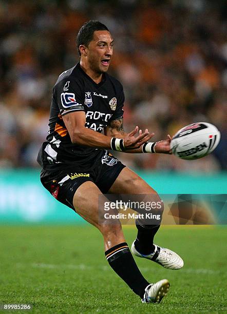 Benji Marshall of the Tigers passes during the round 24 NRL match between the Wests Tigers and the Parramatta Eels at the Sydney Football Stadium on...