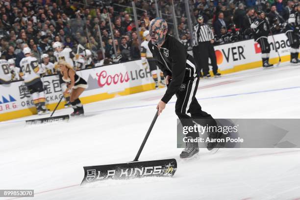 The Los Angeles Kings Ice crew wears masks to mark the release of the Netflix film "Bright" during a game against the Vegas Golden Knights at STAPLES...