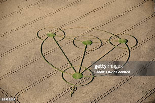 Crop circles adorn wheat fields near to Walkers Hill White Horse and North of Alton Barnes, August 19, 2009 the Vale of Pewsey, Wiltshire, England.