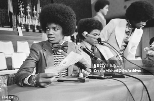 American singer Michael Jackson and the Jackson brothers at a press conference during a visit to Japan, May 1973. From left to right, Michael, Tito...