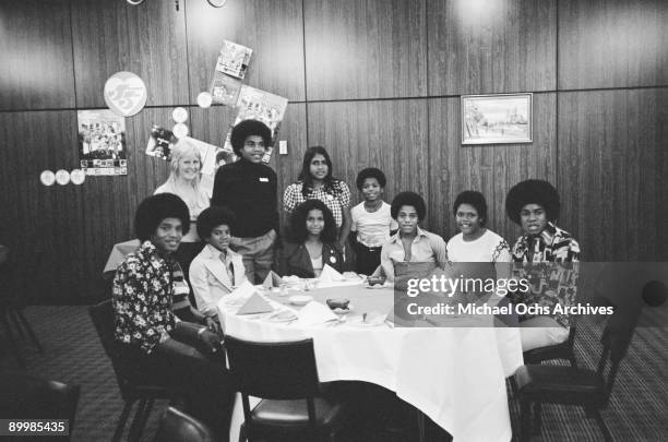 American singer Michael Jackson and the Jackson Five pose with fans during a tour of Australia, 1st July 1973.