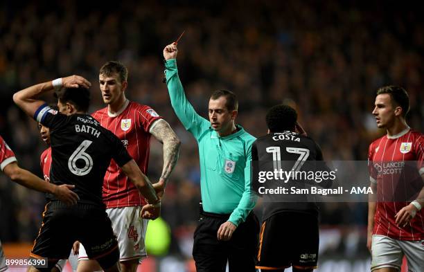 Danny Batth of Wolverhampton Wanderers is shown a red card as he is sent off during the Sky Bet Championship match between Bristol City and...